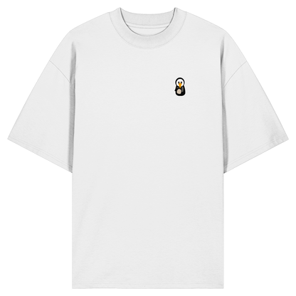 Pingstas Anarcho Mask Oversize Shirt weiß — Vorderansicht mit kleinem Pinguin-Emblem auf der Brust